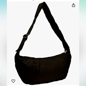 ID black puffer crossbody bag.